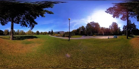 UHD 4K 360 VR Virtual Reality of a city park recreation area. Trees and green Stock Footage 86622695