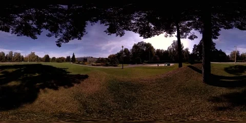 UHD 4K 360 VR Virtual Reality of a city park recreation area. Trees and green Stock Footage 155118245