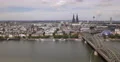 UHD 4K Aerial View Cologne Skyline Establishing Shot Hohenzollern Bridge Day 4k or 4k+ Resolution