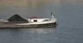 UHD 4K Industrial Coal Barge Fluvial Loaded Boat Cargo Freight Ship Passing 4k or 4k+ Resolution
