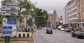 UHD 4K Munich City Center Cars Passing Traffic People Crossing Busy Road Sign 4k or 4k+ Resolution