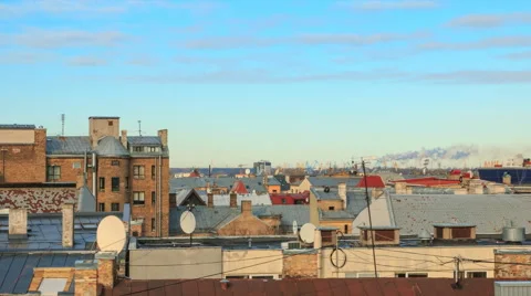 UHD 4K Rooftops with smoke from pipes and cranes on background, timelapse. Video stock 50610495