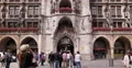 UHD 4K Tilt Up Glockenspiel Marienplatz Munich New Town Hall People Walk Visit 4k or 4k+ Resolution