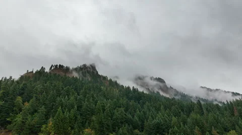 UHD 4k Time Lapse of Rolling Fog over Mountain along Columbia River in Oregon Stock Footage 54482467
