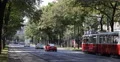 UHD 4K Traditional Tram Passing Vienna Cars Traffic Jam Moving Busy City Street 4k or 4k+ Resolution