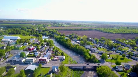 UHD aerial fly over of a small rural town Stock Footage