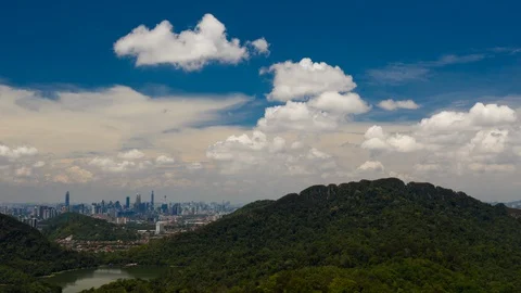 UHD Aerial time lapse view flying over lush green tropical foggy rain forest mou Stock Footage 127631687