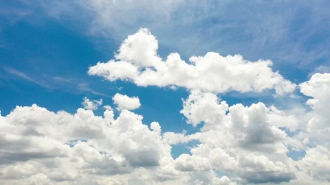 UHD Beautiful bright blue cloudy sky background Time Lapse. White fluffy clouds  Stock Footage 127632092