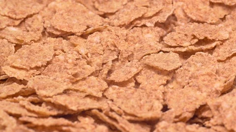UHD closeup shot of the cereal flakes on a rotating stand Video stock 99042385