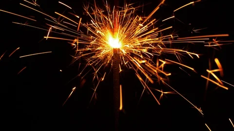 UHD closeup of the sparkler burning in the dark Video stock 93602709