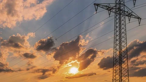 UHD. Dramatic time lapse of power lines pylon Stock Footage 204873626