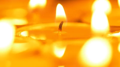 UHD macro of the burning candles Video stock 91411591