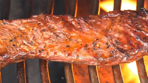 UHD macro of the delicious marinated beef on the grill Video stock 91957069
