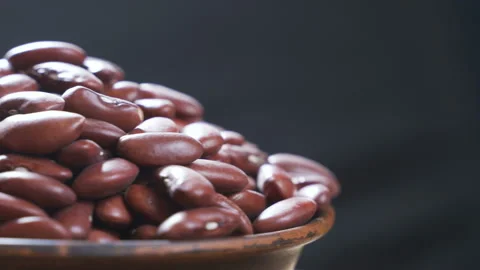UHD macro of the red beans on rotating stand Video stock 99080576
