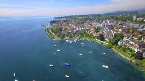 UHD Orbit drone shot around the lovely city of Morges - Switzerland Stock Footage 65184539