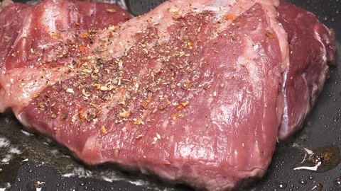 UHD shot of the marbled beef steak frying on the pan Stock-Footage 93602565