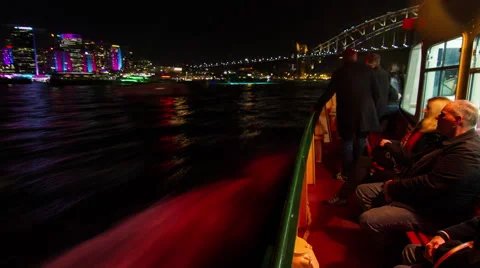 UHD Sydney ferry time lapse during Vivid Sydney boat city lights Stockbeeldmateriaal 52547130