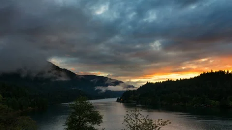 UHD Time Lapse of Low Dark Clouds along Columbia River Gorge at Sunset in Oregon Stock Footage 54480211