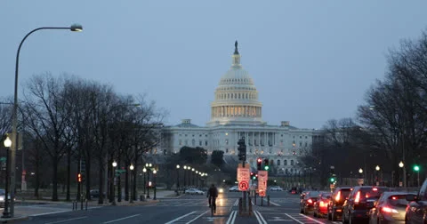 UHD Ultra HD 4K US Capitol Hill Building Washington DC Busy Car Traffic Dusk Stock Footage