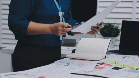 UI designer and UX developer brainstorm idea to design the application appe.. Stock Footage 326018279