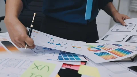 UI designer and UX developer brainstorm idea to design the application appe.. Stock Footage 326018291