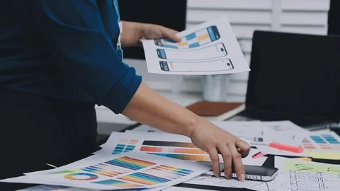 UI designer and UX developer brainstorm idea to design the application appe.. Stock Footage 326018299