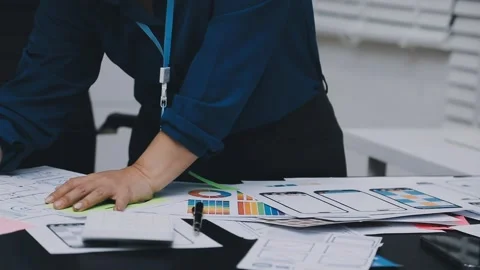 UI designer and UX developer brainstorm idea to design the application appe.. Stock Footage 326018300