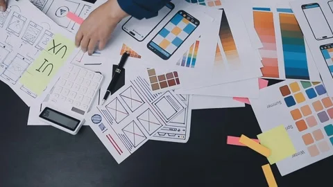 UI designer and UX developer brainstorm idea to design the application appe.. Stock Footage 326018309