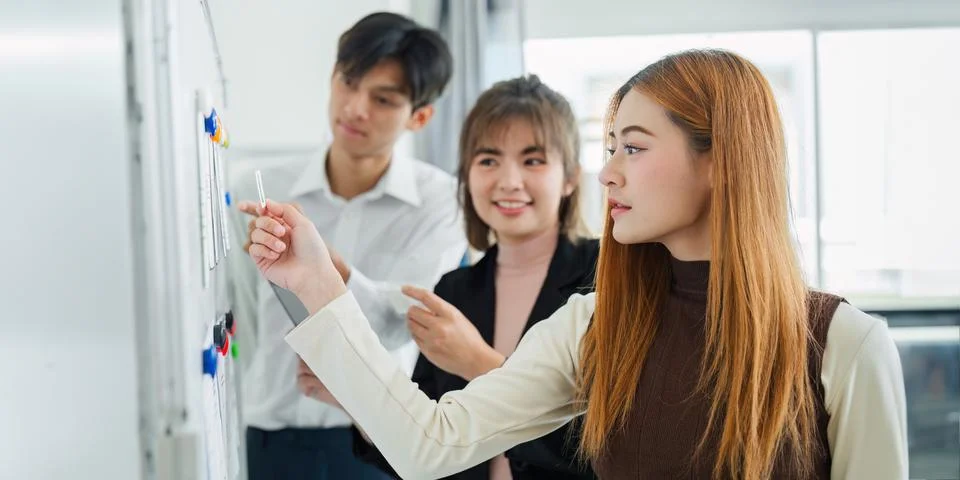 UI designer and UX developer brainstorm idea to design the application interface Stockfoto's