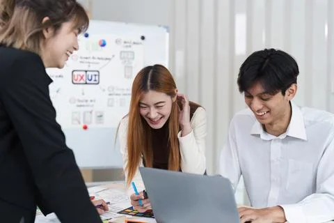 UI designer and UX developer brainstorm together. Creative digital development Stock Photos