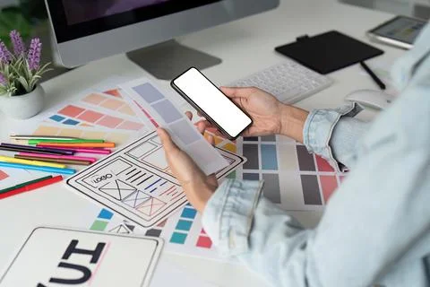 UI designer and UX developer brainstorm idea to design the application interface 스톡 사진