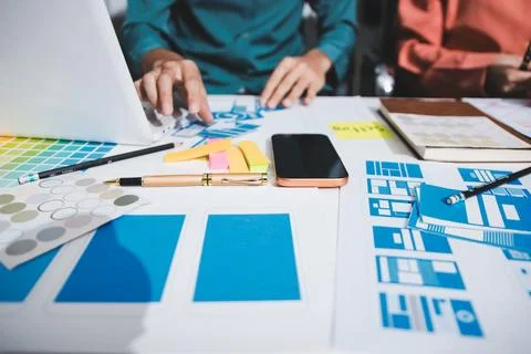 UI designer and UX developer brainstorm idea to design the application appe.. Stock Photos