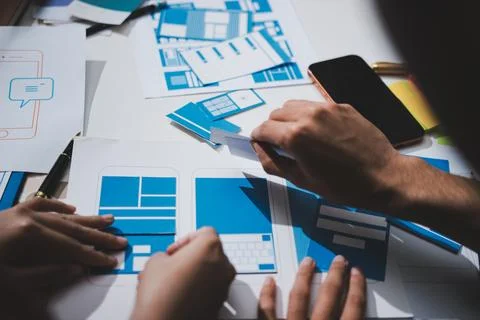 UI designer and UX developer brainstorm idea to design the application appe.. Foto stock