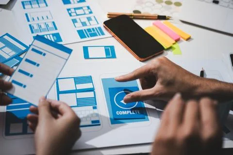 UI designer and UX developer brainstorm idea to design the application appe.. Stock Photos