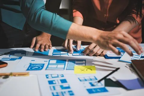 UI designer and UX developer brainstorm idea to design the application appe.. Stock Photos