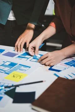 UI designer and UX developer brainstorm idea to design the application appe.. Stock Photos