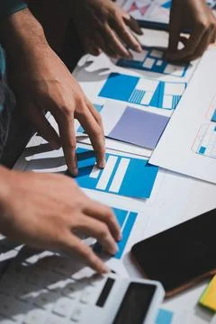 UI designer and UX developer brainstorm idea to design the application appe.. Stockfoto's