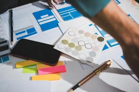 UI designer and UX developer brainstorm idea to design the application appe.. Stock Photos