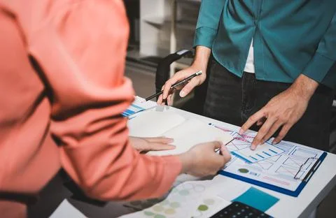 UI designer and UX developer brainstorm idea to design the application appe.. Stock Photos
