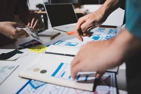 UI designer and UX developer brainstorm idea to design the application appe.. Stock Photos