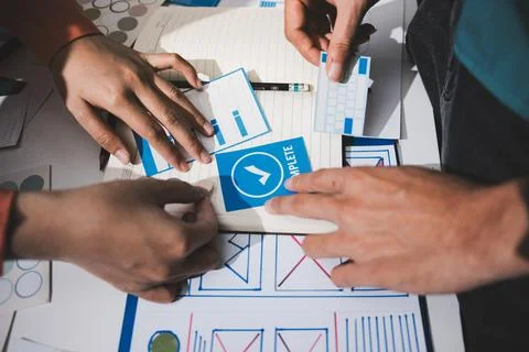 UI designer and UX developer brainstorm idea to design the application appe.. Stock Photos