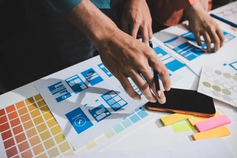 UI designer and UX developer brainstorm idea to design the application appe.. Stock Photos