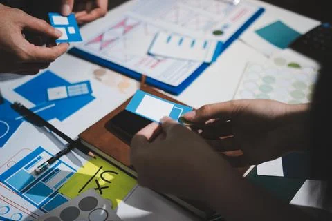 UI designer and UX developer brainstorm idea to design the application appe.. Stock Photos