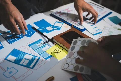 UI designer and UX developer brainstorm idea to design the application appe.. Stock Photos