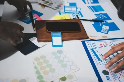 UI designer and UX developer brainstorm idea to design the application appe.. Stock Photos