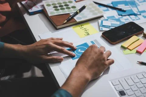 UI designer and UX developer brainstorm idea to design the application appe.. Stock Photos