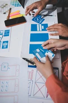 UI designer and UX developer brainstorm idea to design the application appe.. 스톡 사진