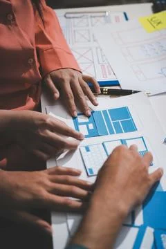 UI designer and UX developer brainstorm idea to design the application appe.. 写真素材