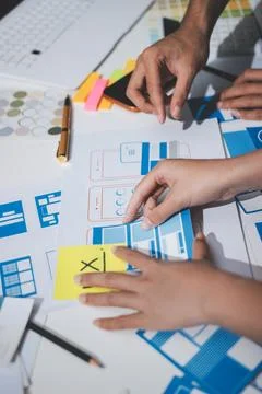 UI designer and UX developer brainstorm idea to design the application appe.. 写真素材