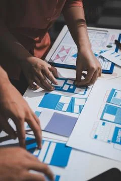 UI designer and UX developer brainstorm idea to design the application appe.. 写真素材